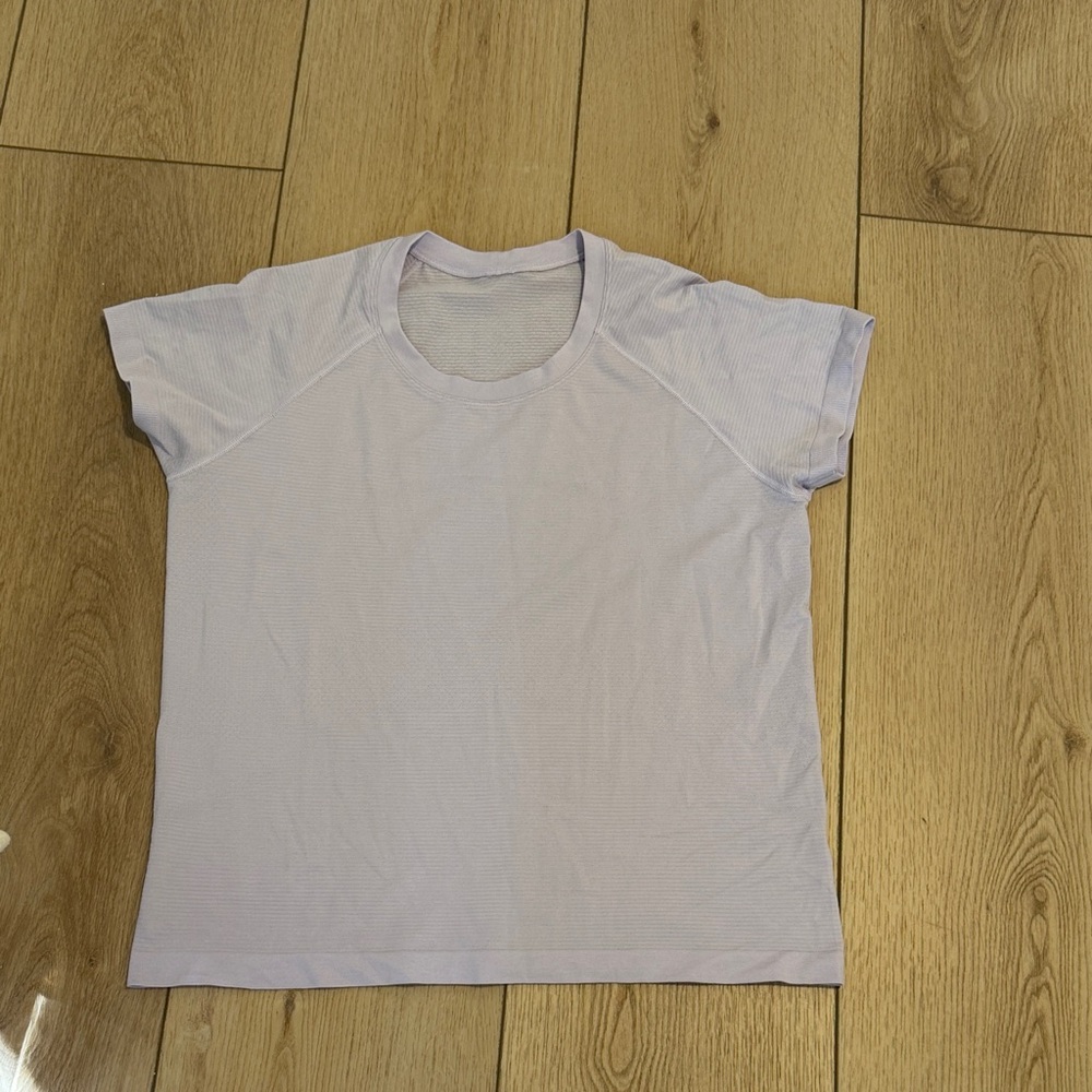 Lululemon Lavender swiftly race size 12 excellent condition